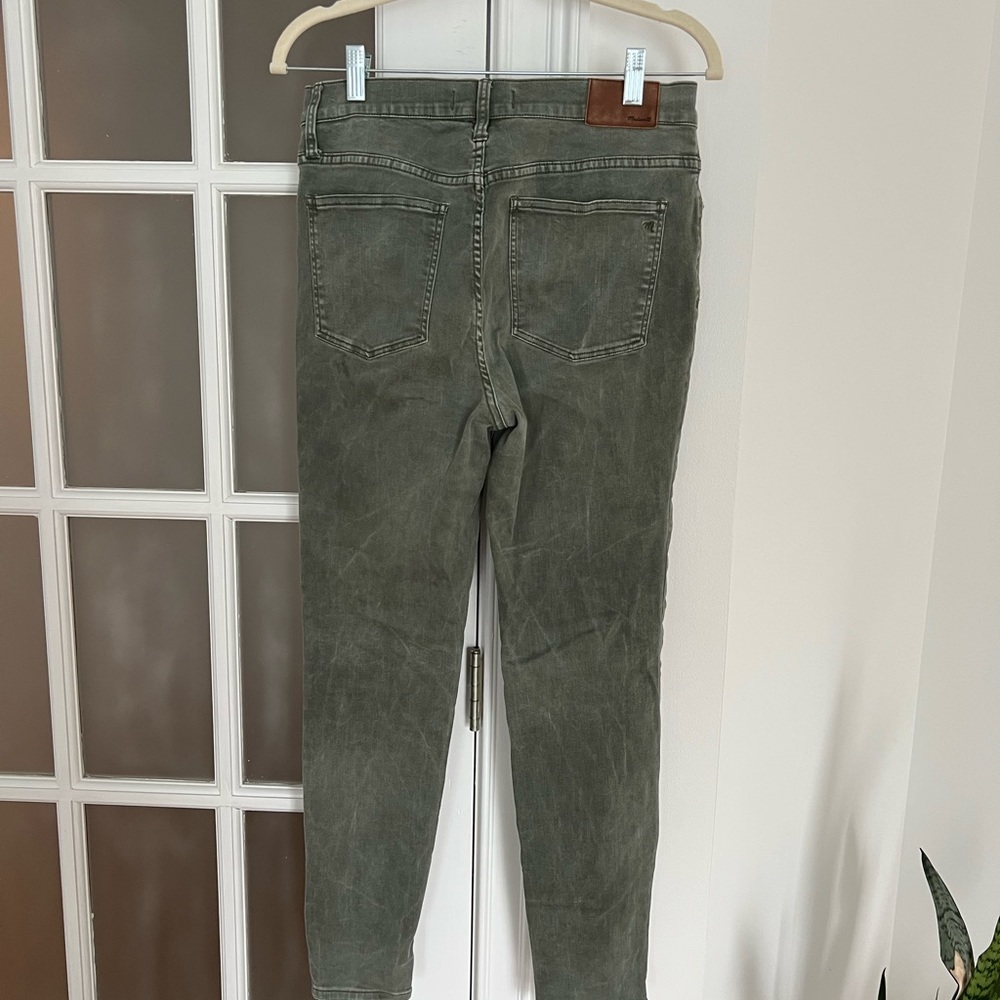 Madewell distressed wash green skinny pants with button fly